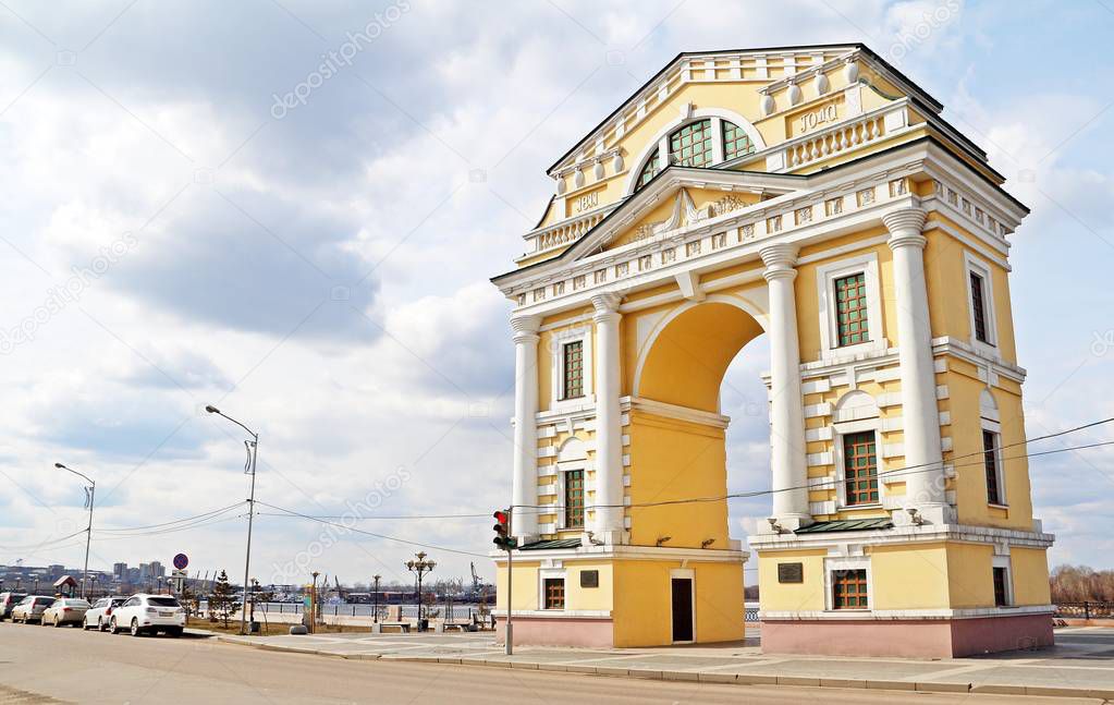 Yellow Triumphal Arch Moscow Gates near Angara river in Irkutsk city, Russia. A gate to Moscow.