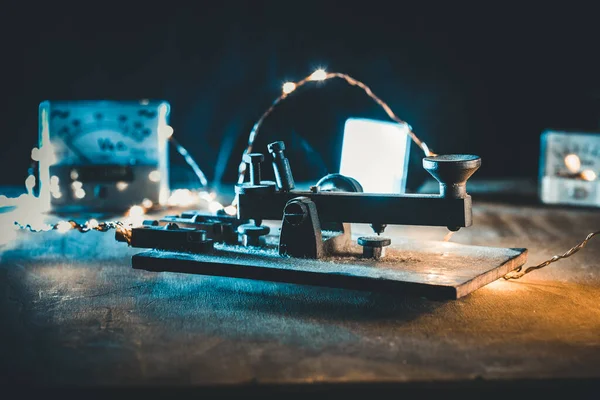 Vintage military telegraph with black background.