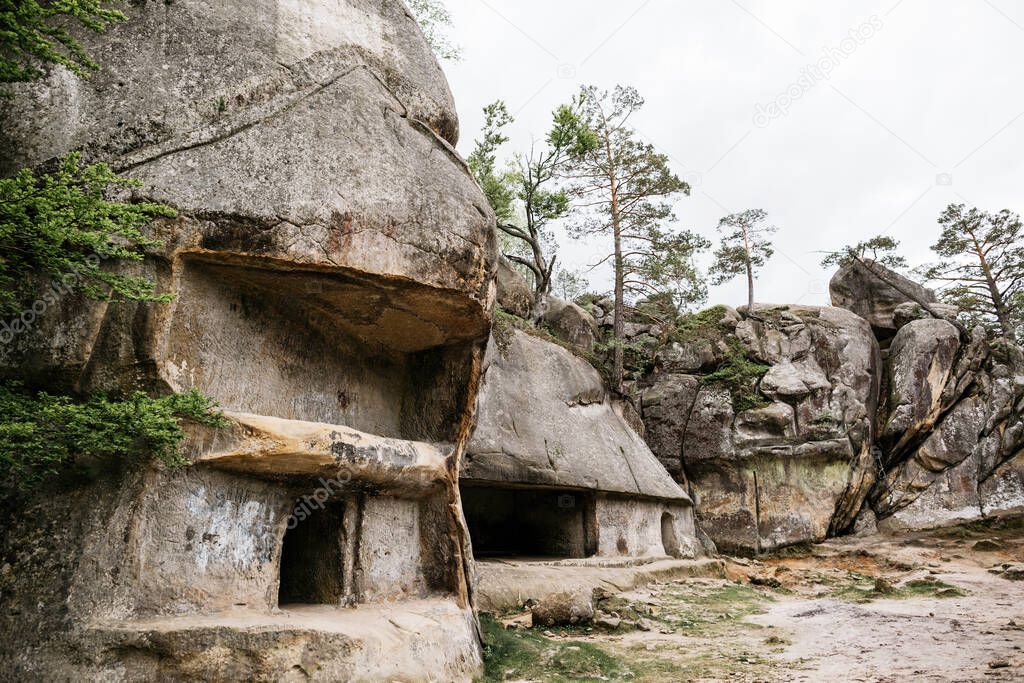 Cave city in the mountains among the woods in the national park. Dovbush rocks, Ukraine