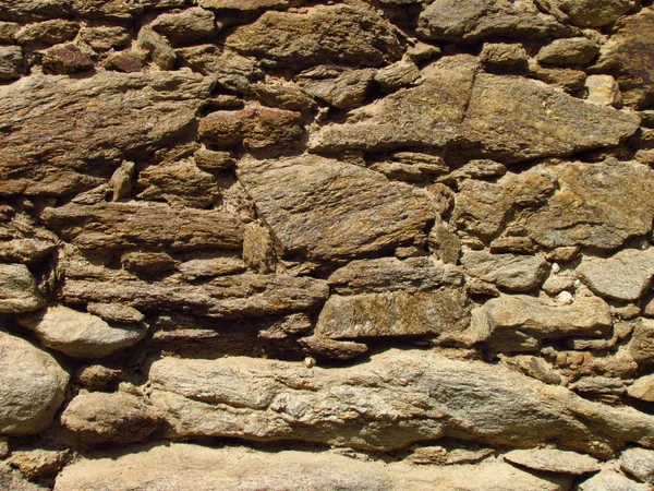 Bir kırsal inşaat, doğal taş doku eski bir taş duvar detay — Stok fotoğraf