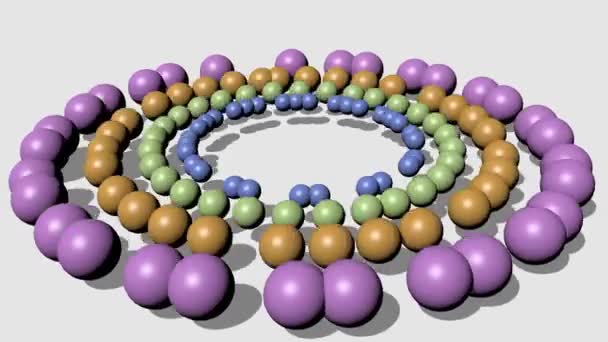 Nádherné pastelové barevné korálky pohybující se v kruhu na bílém pozadí. 3D video abstraktní pozadí