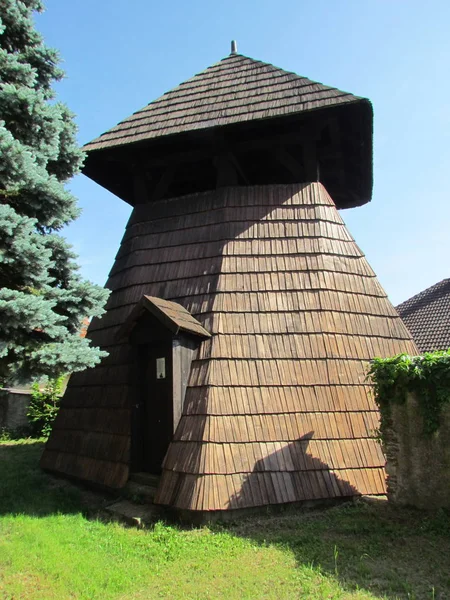 Wooden country bell tower, thatched structure, historical cultural heritage — 스톡 사진