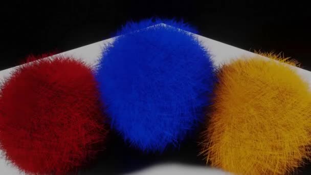 Growing furry pompons on black background. Funny hairy multicolored circle objects in green, red and turquoise, abstract animated movie — Stock Video