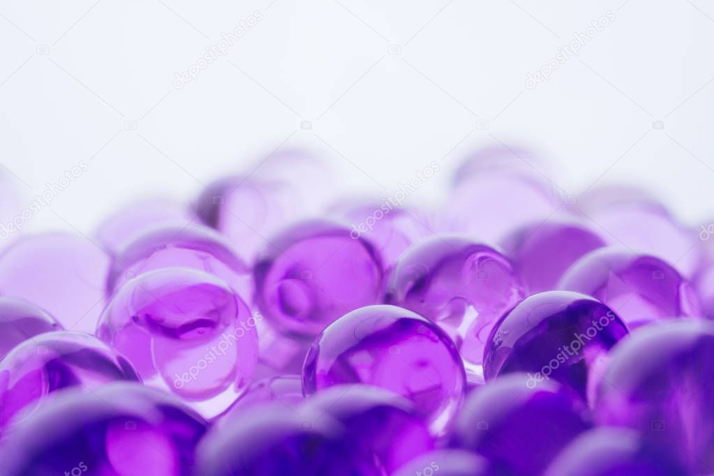 Abstract background with shiny water balls in violet and blue colors