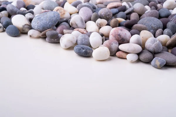 Varied Pebbles White Background Angle View — Stock Photo, Image