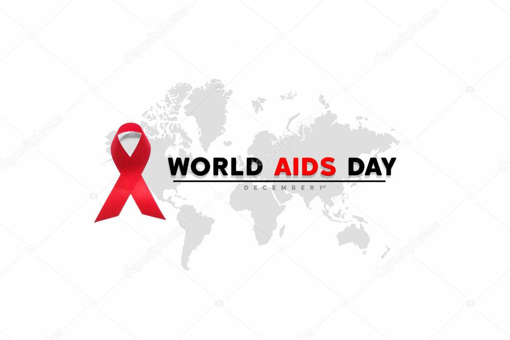 red AIDS awareness ribbon on the white paper background. World aids day and healthcare and medicine concept