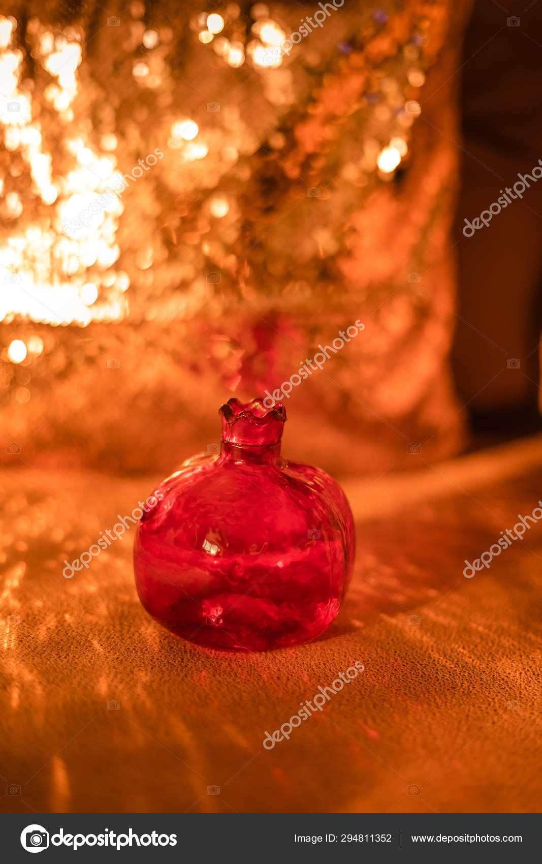Pomegranate Red Glass Vase With Beautiful Bokeh On Background