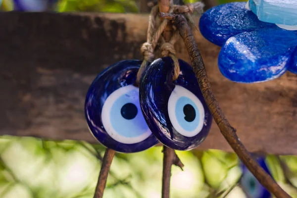 Multicolored nazar - evil eye amulets in store on the street