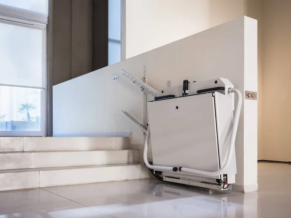 Disability stairs lift facility indoor building Wheelchair elevator — Stock Photo, Image