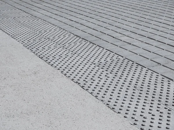 Chão de deficiência Pathway textura cidade rua passarela — Fotografia de Stock