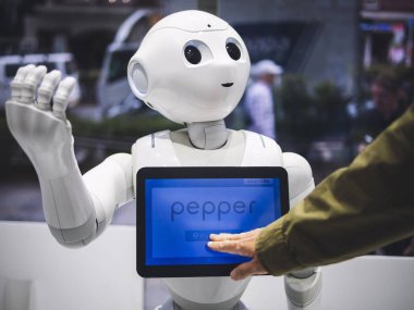 TOKYO, JAPAN - APR 16, 2018 : Pepper Robot Humanoid Assistant  clipart