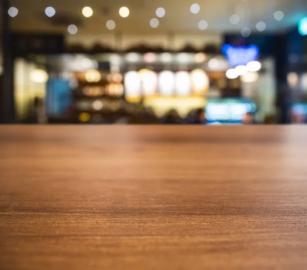 Table top wooden counter Blur Bar cafe restaurant Interior backg — Stock Photo, Image