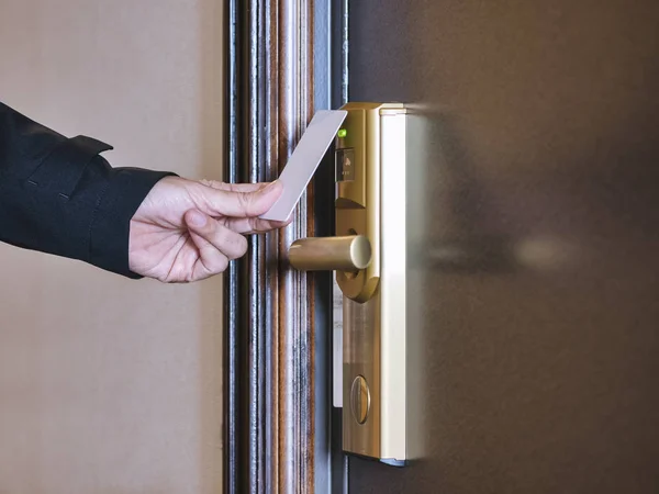 Hand Holding Key card Hotel room access Security system — Stock Photo, Image