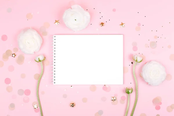 Notebook with flowers on pink pastel background — Stock Photo, Image