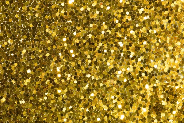 Gold abstrakter Hintergrund mit Bokeh, defokussierte Weihnachtsbeleuchtung. — Stockfoto
