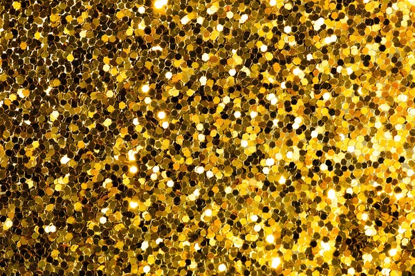 Gold abstrakter Hintergrund mit Bokeh, defokussierte Weihnachtsbeleuchtung. — Stockfoto