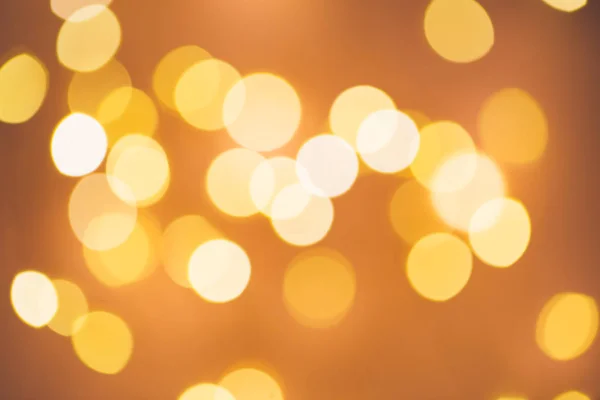 Blurred golden festive lights — Stock Photo, Image