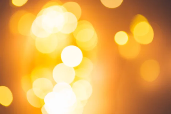 Blurred golden festive lights — Stock Photo, Image