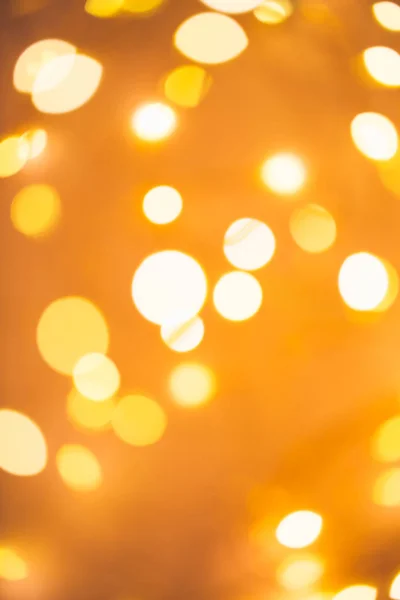 Blurred golden festive lights — Stock Photo, Image