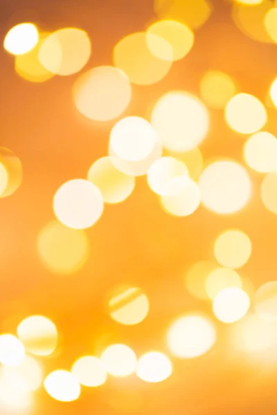 Blurred golden festive lights — Stock Photo, Image