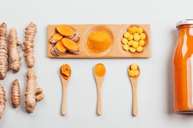 Farklı koşullarda zerdeçal: taze, Kuru kök, hap, toz ve bitki kesme.