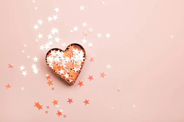 Heart with sparkles and shape for gingerbread on Living Coral background. Color of the year 2019 concept.