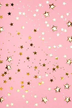 Altın yıldız, pembe arka plan glitter.
