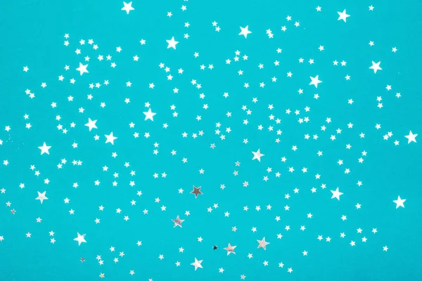 Silver stars on blue background