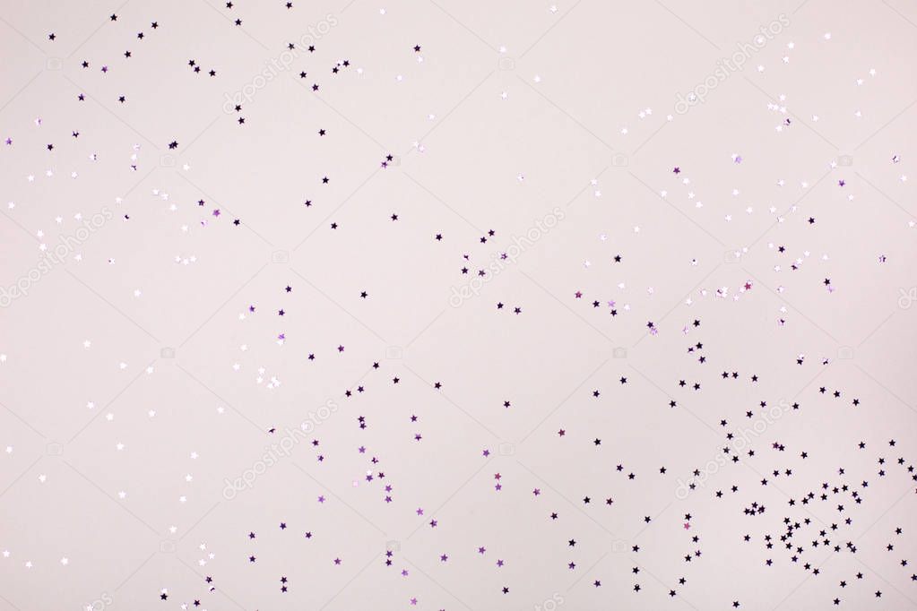 Little purple stars on grey background