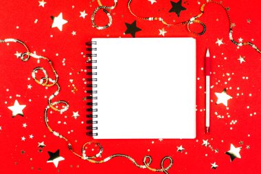 Notebook with page for goals and resolutions clipart