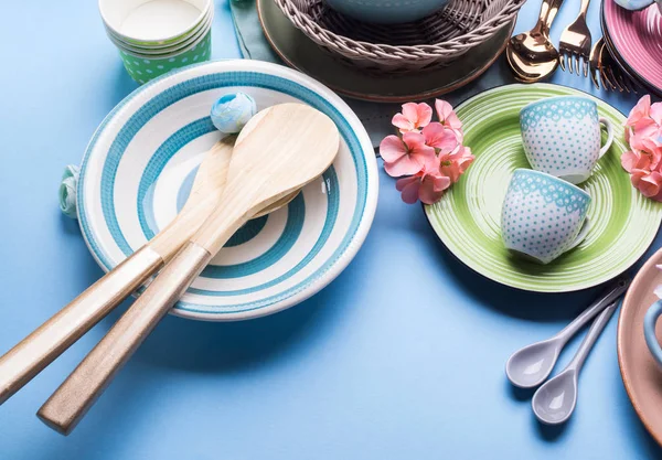 Tableware dish set on blue pastel background
