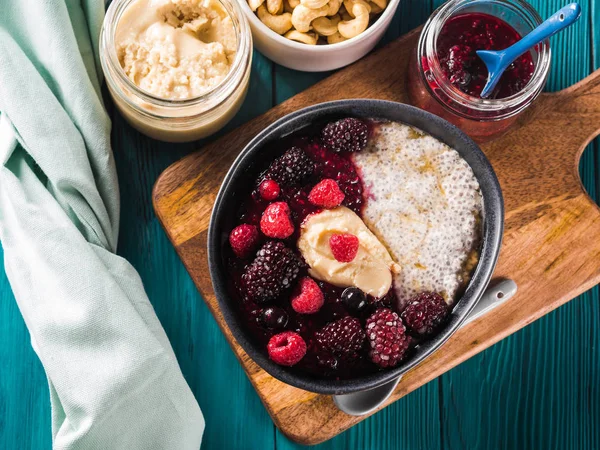 Vegan Chia pudding with berries and almond butter — Stock Photo, Image