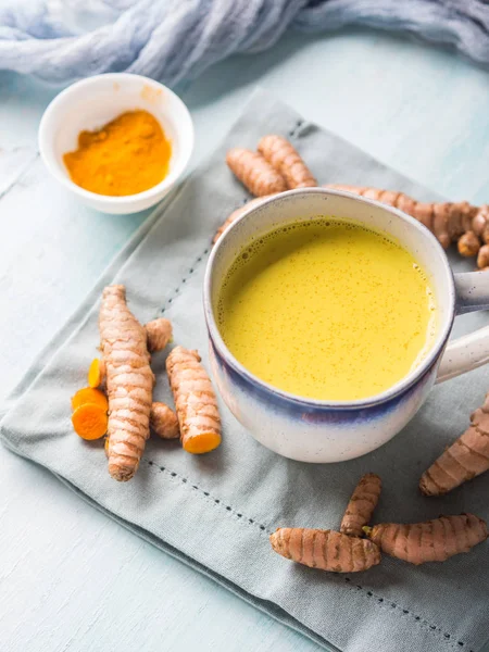 Golden turmeric milk drink in mug — Stok Foto