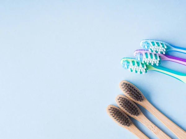 Plastic toothbrushes versus bamboo. Concept — Stock Photo, Image