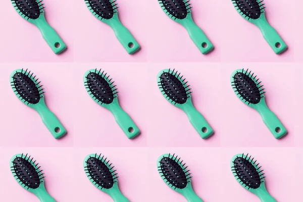 Grünes Haarpinselmuster auf rosa — Stockfoto