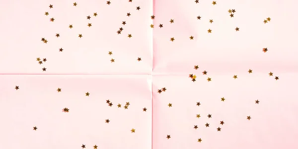 Fundo de papel rosa com estrelas e luzes — Fotografia de Stock
