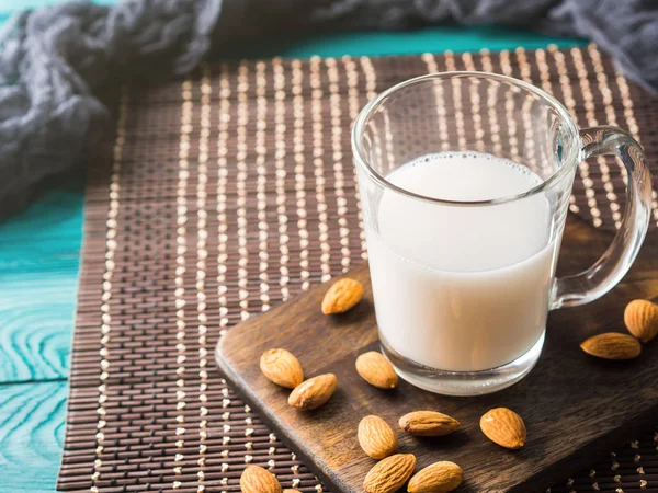 Vegan plant almond milk in a glass mug — Stock Photo, Image