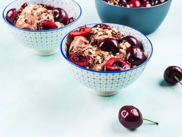 Chocolate ice cream sundae with cherries — Stock Photo, Image