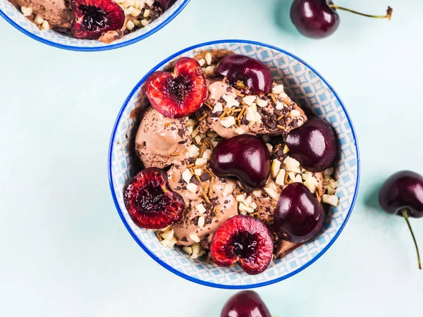 Chocolate ice cream sundae with cherries — Stock Photo, Image