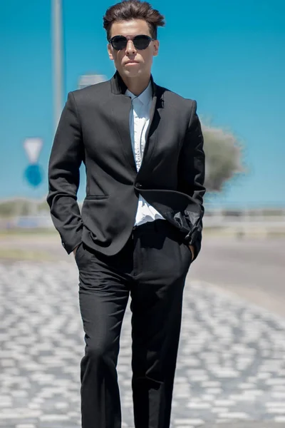 A man in a black classic suit — Stock Photo, Image