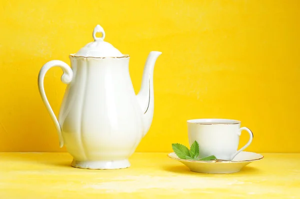 Cup Tea Kettle Yellow Background — Stock Photo, Image