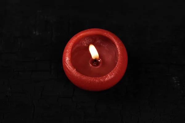 Red Candle Burning Fire Black Wooden Rustic Background Place Text — Stock Photo, Image