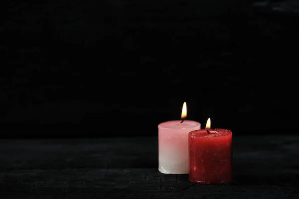 Two Candles Lit Fire Black Background Empty Space Text Copyspace — Stock Photo, Image