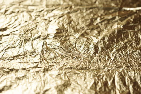 Abstrakt bakgrund av guld mousserande — Stockfoto