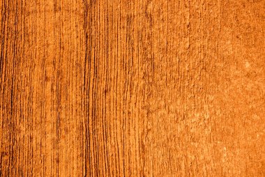 Turuncu soyut arka plan, beton zeminde çizikler var..