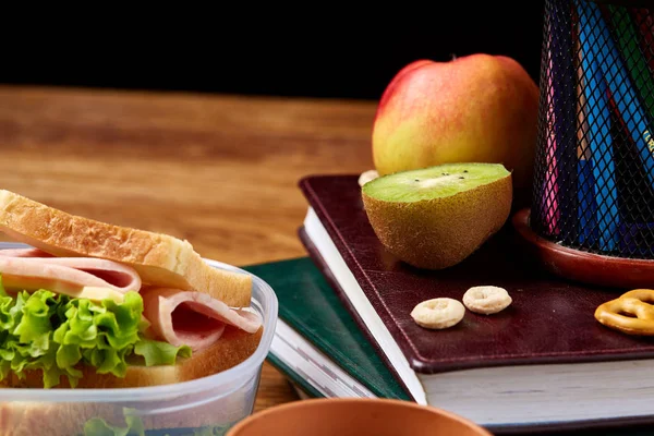 Healthy eating kids menu on school lunch background, shallow depth of field, close-up.