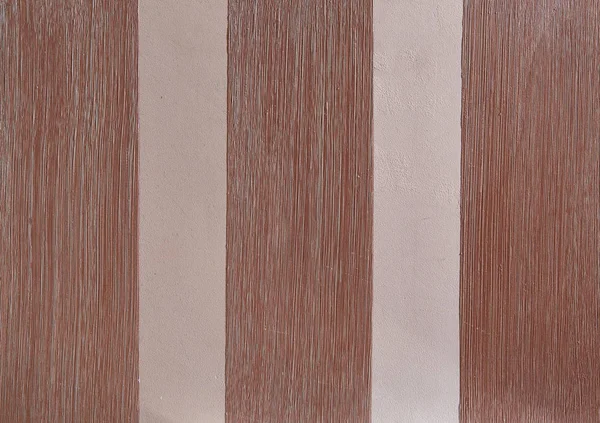 Абстрактні паралельні смуги бежевого і світло-коричневого кольору на оштукатуреному фоні стіни, крупним планом, макрос . — стокове фото