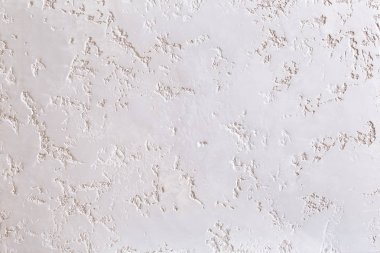 Beyaz duvar arka plan sıvalı soyut model, yakın çekim, makro.