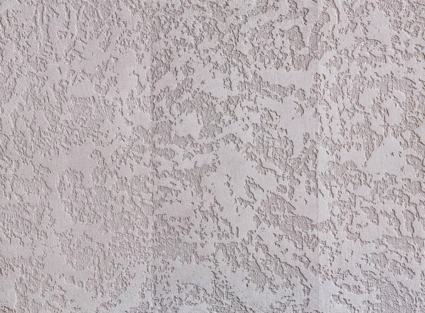 ベージュは石膏テクスチャ背景です。ベージュの漆喰。壁に漆喰の質感. — ストック写真