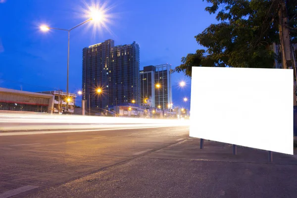 billboard and light street side on bokeh light background,